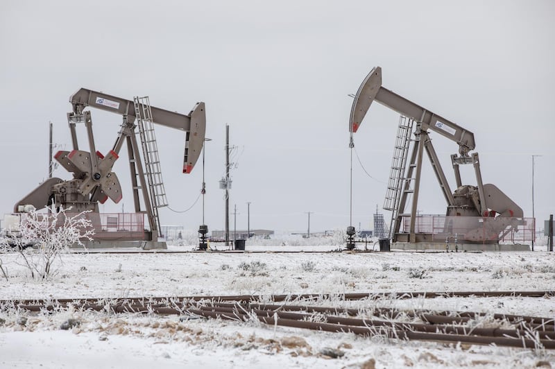 Pump jacks operate in the Permian Basin in Midland, Texas. The Arctic freeze gripping the central US is raising the spectre of power cuts in the state and placing pressure on energy already trading at record prices. Bloomberg