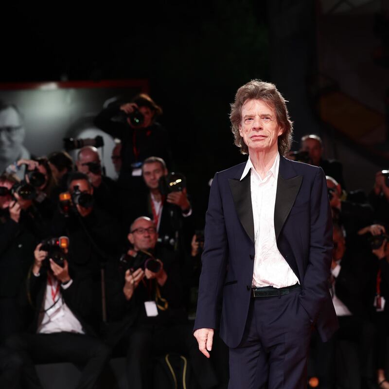 VENICE, ITALY - SEPTEMBER 07: (EDITORS NOTE: Retransmission with alternate crop.) Mick Jagger walks the red carpet ahead of the "The Burnt Orange Heresy" during the 76th Venice Film Festival at Sala Grande on September 07, 2019 in Venice, Italy. (Photo by Vittorio Zunino Celotto/Getty Images)