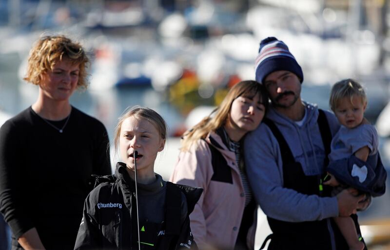 Climate change activist Greta Thunberg speaks upon her arrival at Santo Amaro port in Lisbon, Portugal December 3, 2019. REUTERS/Pedro Nunes