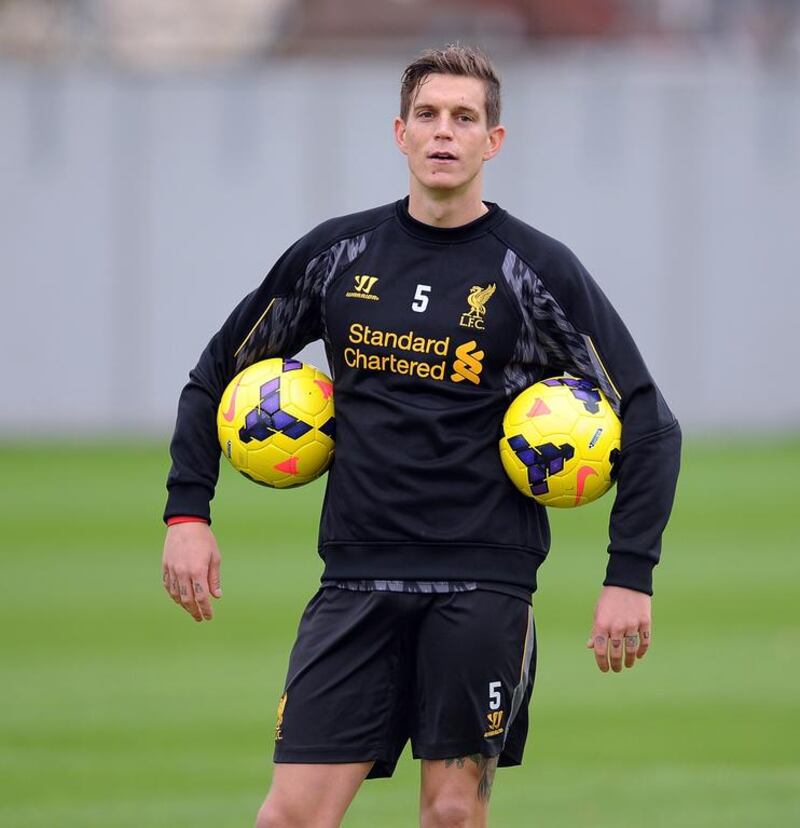 Despite having a skill set seemingly ideal for his manager's style of play, Daniel Agger, pictured at training on October 31, 2013, has struggled to find playing time for Liverpool this season. John Powell / Getty Images