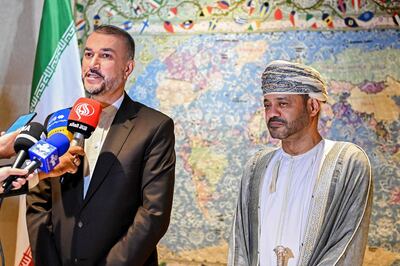 Omani Foreign Minister Sayyid Al Busaidi (R) and his Iranian counterpart Hossein Amirabdollahian hold a press conference after their meeting in Muscat on Wednesday. AFP