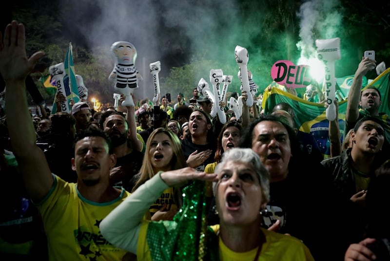 Supporters of Jair Bolsonaro celebrate his victory at the Paulista Avenue, in Sao Paulo. EPA