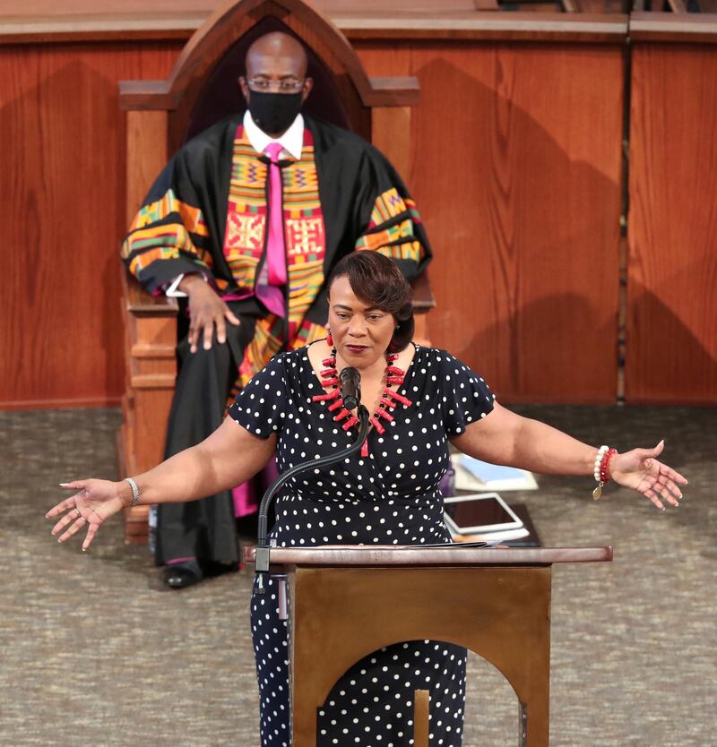 Dr Bernice King speaks in front of Rev Raphael G Warnock during the funeral. Reuters