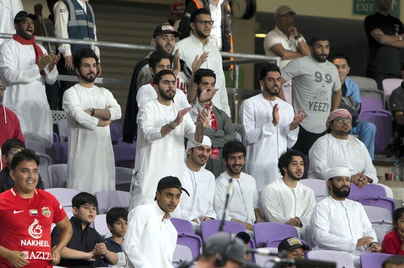 AL AIN, UNITED ARAB EMIRATES - Crowd cheering for their team at Al Wahda vs Shabab Al Ahli Dubai AGC Final Match at Hazza Bin Zayed Stadium, Al Ain.  Leslie Pableo for The National