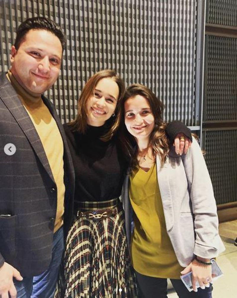 Emilia Clarke, centre, with Waad al-Kateab right and her husband Dr. Hamza al-Kateab. Instagram