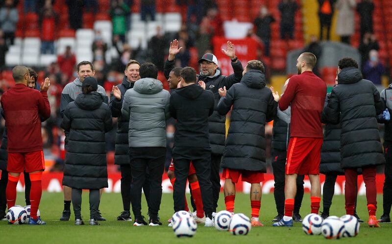 Liverpool's Georginio Wijnaldum is given a guard of honour after the match. PA