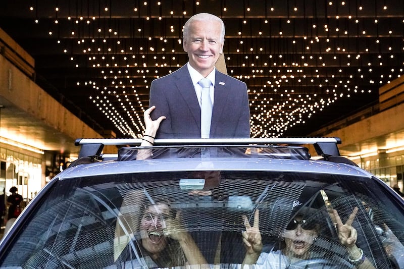 Motorists celebrate after the 2020 presidential election is called for President-elect Joe Biden, Saturday, November 7, in Philadelphia. AP