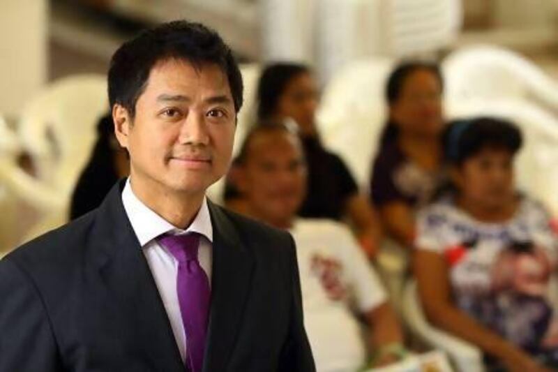 Delmer Cruz, the labour attache at the Philippine overseas labour office in Dubai, says training to increase the financial literacy of Filipinos will be a collaboration between the private and public sector. Satish Kumar / The National