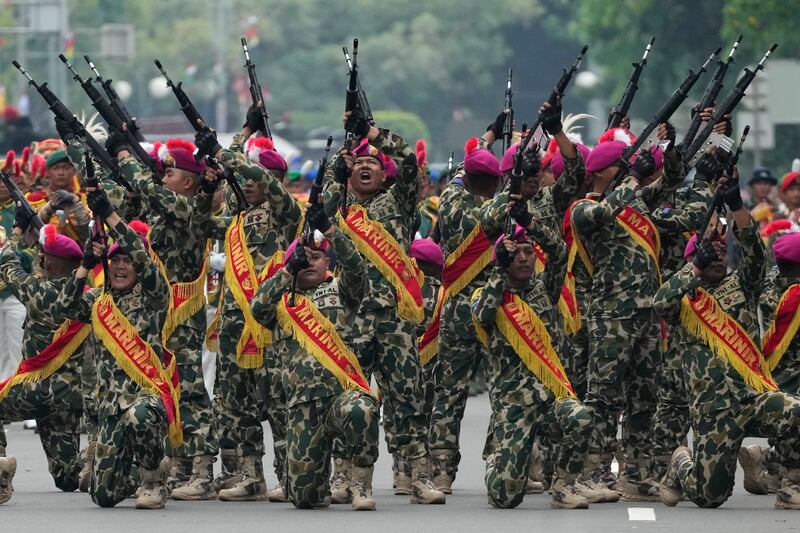 Marines perform at an Armed Forces Day parade commemorating the 77th anniversary of the Indonesian military in Jakarta. AP