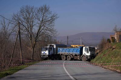 Road barricaded with trucks by Serbs in the village of Rudare, near the town of Zvecan. AFP.