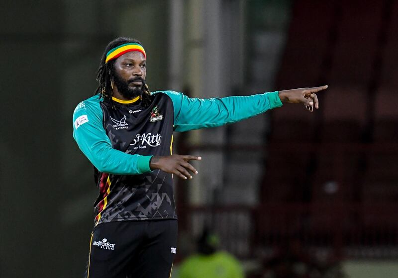 PROVIDENCE, GUYANA - SEPTEMBER 12: In this handout image provided by CPL T20, Chris Gayle of St Kitts & Nevis Patriots set the field during the Hero Caribbean Premier League Play-Off match 32 between St Kitts & Nevis Patriots and Jamaica Tallawahs at Guyana National Stadium on September 12, 2018 in Providence, Guyana. (Photo by Randy Brooks - CPL T20/Getty Images)