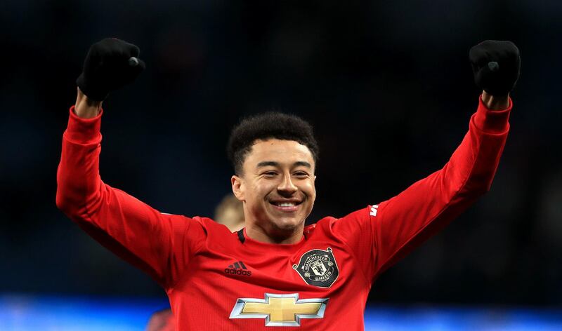 Lingard after the final whistle marked Manchester United's win at rivals City. PA