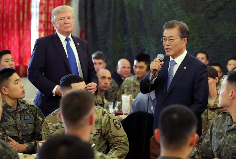 South Korean president Moon Jae-in delivers a speech as he and US president Donald Trump meet South Korean and US soldiers over lunch at Camp Humphreys in Pyeongtaek, South Korea. Yonhap / EPA