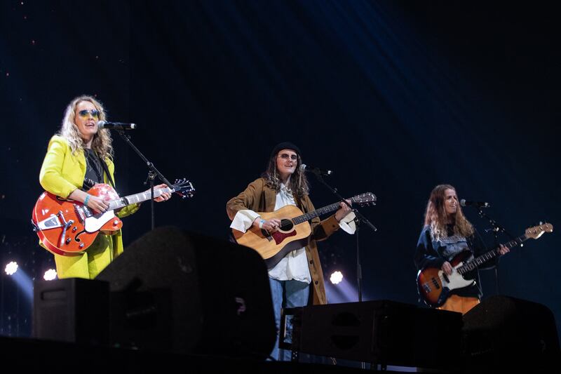 The trio Systur perform 'Med Haekkandi Sol' on behalf of Iceland during Eurovision in Concert. AFP