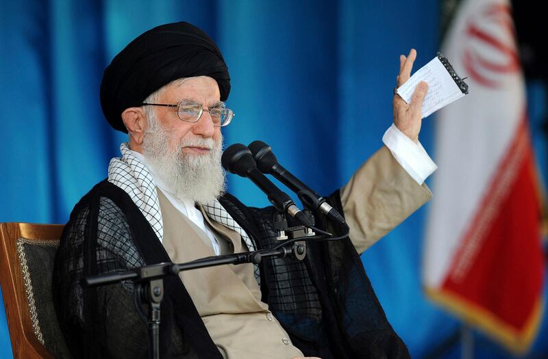 In this picture released by official website of the office of the Iranian supreme leader, Supreme Leader Ayatollah Ali Khamenei gestures while speaking during a gathering of thousands of members of the Basij, an all-volunteer force under paramilitary Revolutionary Guard, at the Azadi (Freedom) stadium in Tehran, Iran, Thursday, Oct. 4, 2018. Khamenei said the Islamic Republic will "slap" the United States by defeating new American sanctions targeting the nation. (Office of the Iranian Supreme Leader via AP)