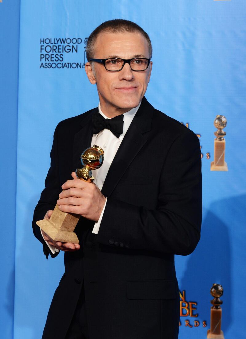 Actor Christoph Waltz poses with Best Supporting Actor in a Motion Picture Award in the press room during the 70th Annual Golden Globe Awards held at The Beverly Hilton Hotel on January 13, 2013 in Beverly Hills, California.   Kevin Winter/Getty Images/AFP== FOR NEWSPAPERS, INTERNET, TELCOS & TELEVISION USE ONLY ==
 *** Local Caption ***  252337-01-09.jpg