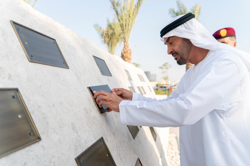 MAHWI, UNITED ARAB EMIRATES - September 04, 2019: HH Sheikh Mohamed bin Zayed Al Nahyan, Crown Prince of Abu Dhabi and Deputy Supreme Commander of the UAE Armed Forces, places a memorial plaque during the inauguration of the Presidential Guard Martyrs Park, at Mahwi Military Camp.

( Rashed Al Mansoori / Ministry of Presidential Affairs )
---