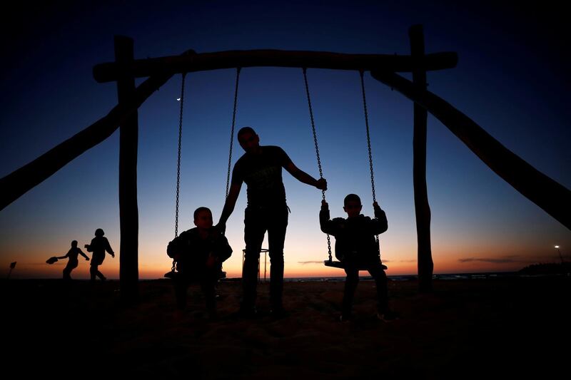 Muslims celebrate the Eid Al Fitr holiday on the beach as authorities ease coronavirus disease restrictions, in Ashkelon, southern Israel. Reuters