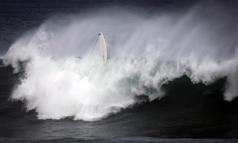 A surfer is wiped out on La Zurriola beach in San Sebastian, Basque Country, northern Spain, on Tuesday, 27 October. EPA