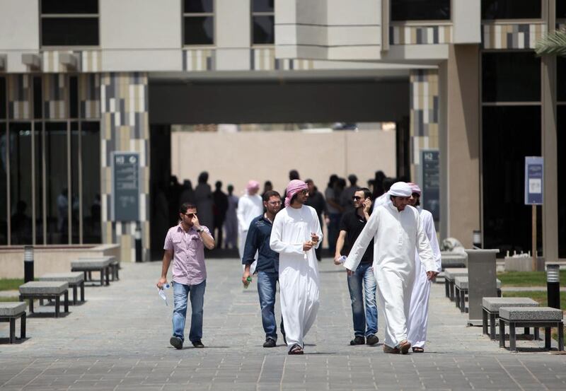 Students attend the first day of school at the men’s campus of UAE University in Al Ain. Sammy Dallal / The National