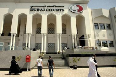 A woman and her husband have been accused of stealing more than a million dirhams from an insurance company in Dubai. The National
