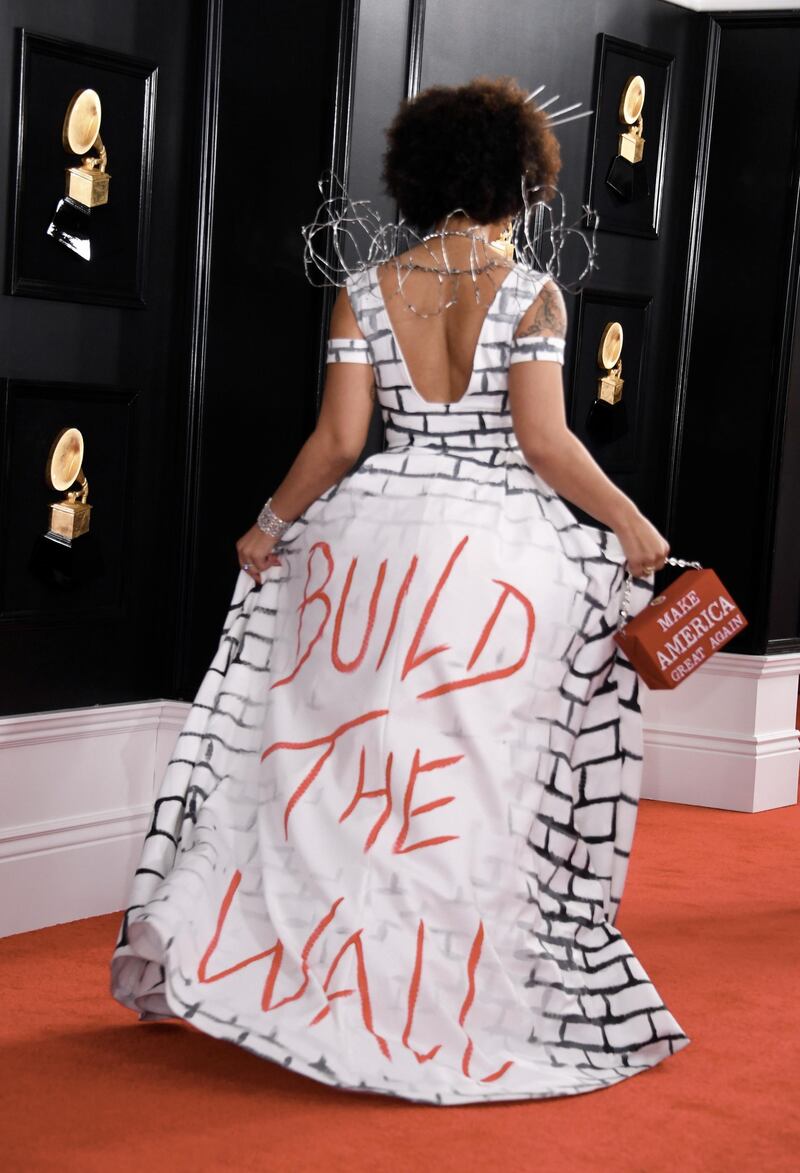 Joy Villa wearing a pro-Trump gown on the red carpet. AFP