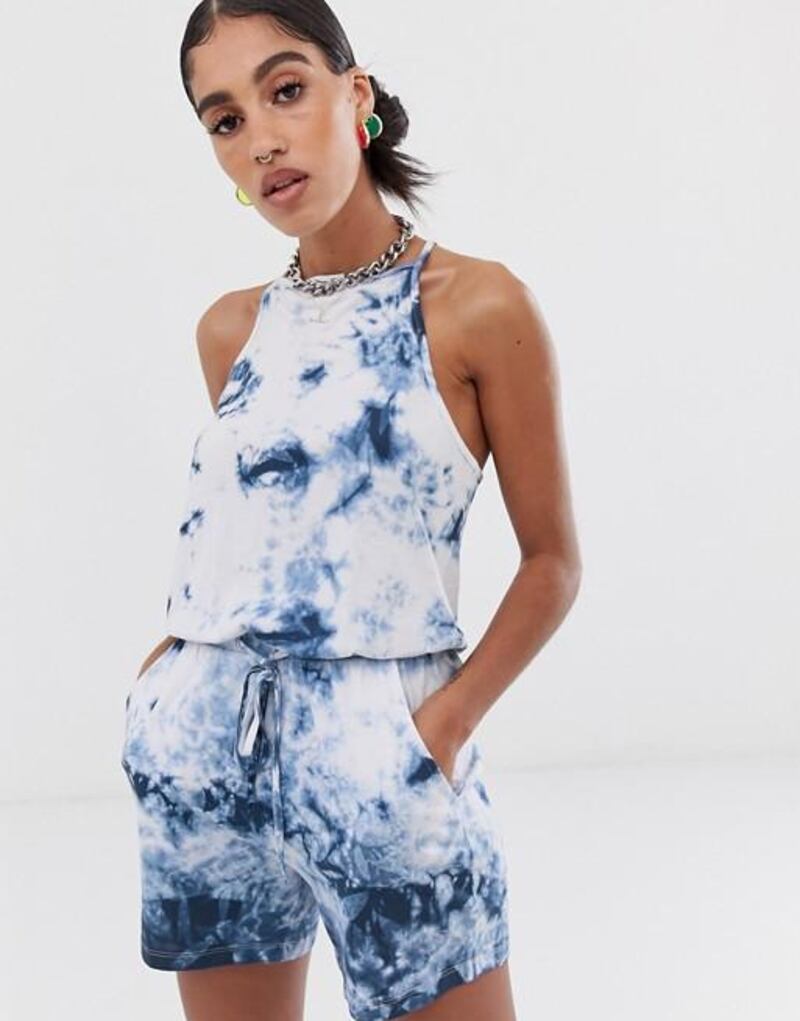 Tie-dye, as seen in this ASOS jumpsuit, is a key trend for summer. Courtesy ASOS