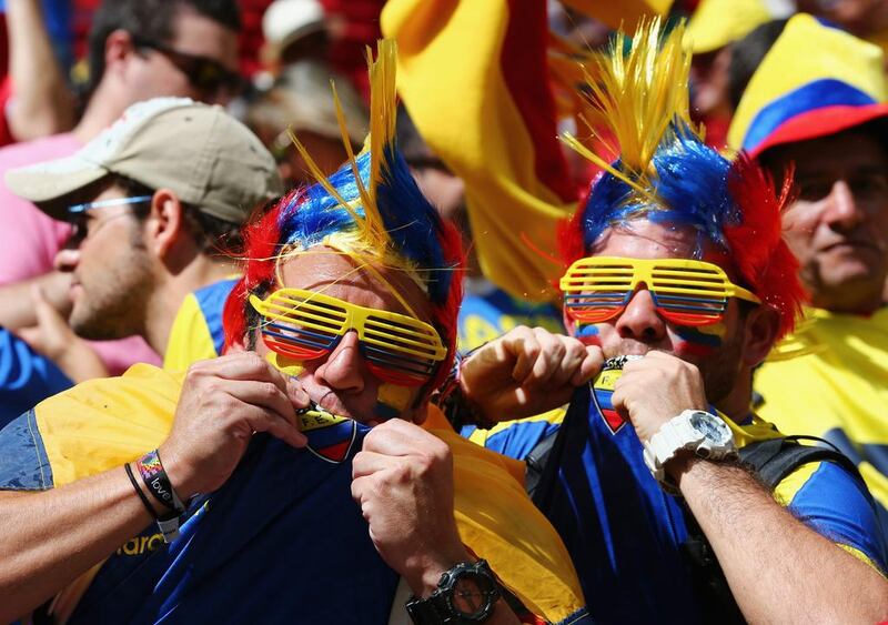 Ecuador fans cheer during their nation's match against Switzerland at the 2014 World Cup on Sunday in Brasilia, Brazil. Clive Brunskill / Getty Images