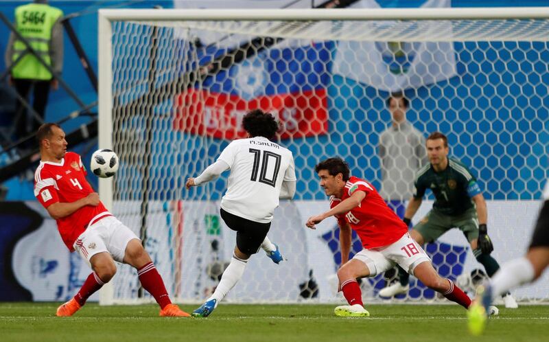 Mohamed Salah shoots at goal against Russia. Lee Smith / Reuters