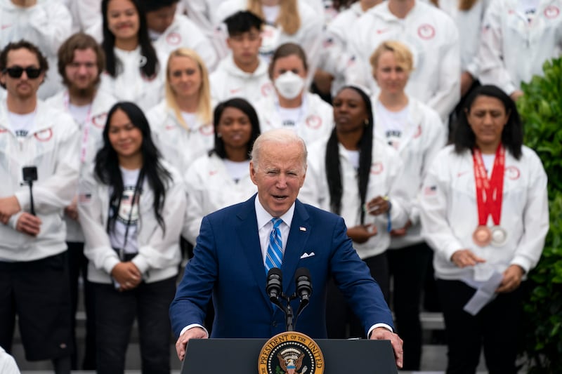 President Joe Biden speaking to athletes at the White House. AP