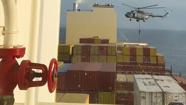 Commandos raid a ship near the Strait of Hormuz by helicopter Saturday.  AP Photo