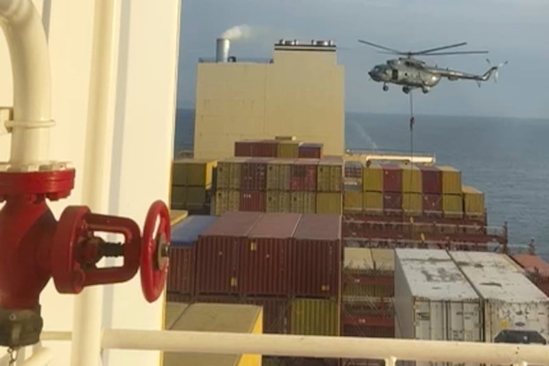 Commandos raid a ship near the Strait of Hormuz by helicopter Saturday.  AP Photo