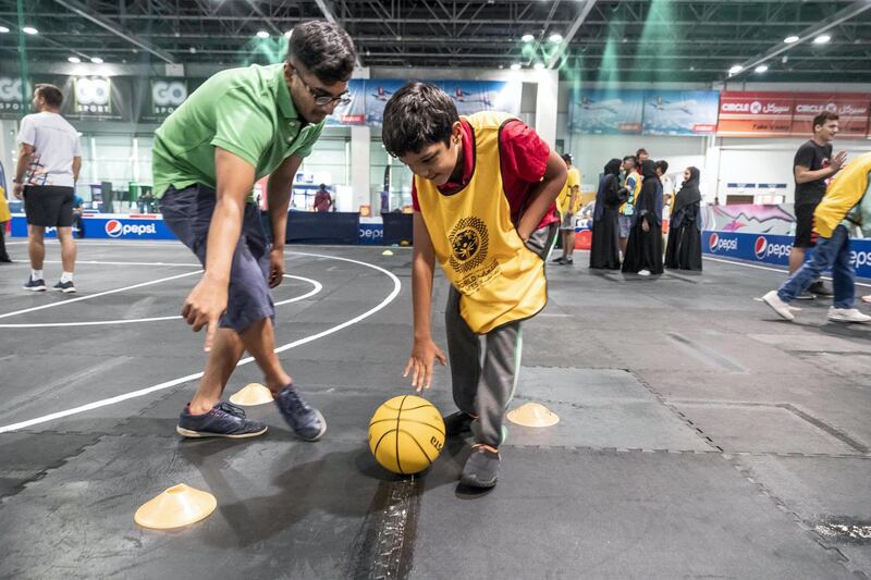 DUBAI, UNITED ARAB EMIRATES. 23 JULY 2018. Special Olympics are running a summer camp at Dubai Sports World for young people with intellectual disabilities at Dubai World Trade Centre. So far over 40 people with intellectual disabilities have taken part in weekly training sessions including football, basketball and cycling alongside ambassadors and members of the Special Olympics UAE team. (Photo: Antonie Robertson/The National) Journalist: Standalone. Section: National.