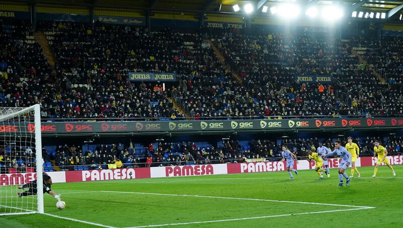 Barcelona's Philippe Coutinho scores his side's third goal from the penalty spot. AP Photo