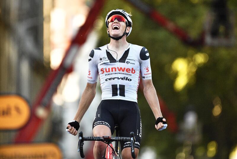Danish rider Soren Kragh Andersen celebrates winning Stage 14  of the Tour de France on Saturday, September 12. EPA