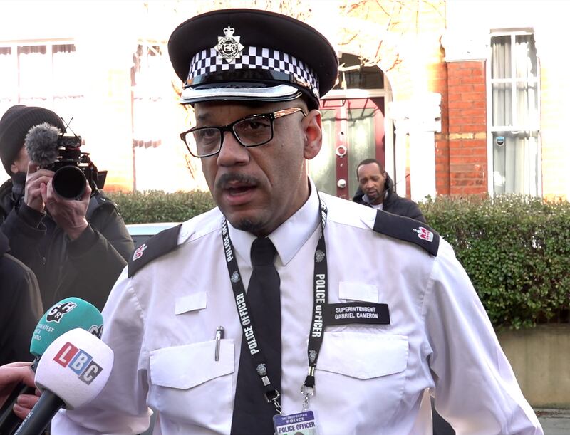 Superintendent Gabriel Cameron reading a statement to the media at the scene of the attack in Lessar Avenue, south London, following the attack. PA