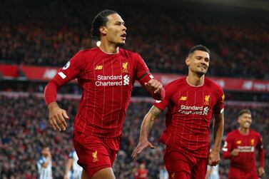 LIVERPOOL, ENGLAND - NOVEMBER 30: Virgil van Dijk of Liverpool celebrates goal during the Premier League match between Liverpool FC and Brighton & Hove Albion at Anfield on November 30, 2019 in Liverpool, United Kingdom. (Photo by Clive Brunskill/Getty Images)