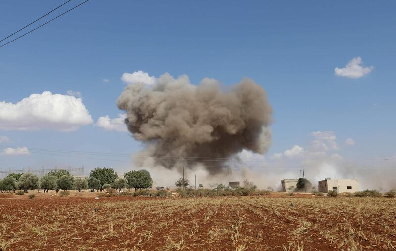 Smoke billows following Syrian government forces' bombardment around the village of al-Muntar on the southern edges of the rebel-held Idlib province. AFP