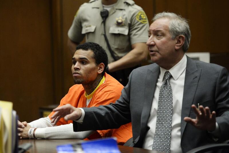 Chris Brown is seen in the courtroom with attorney Mark Geragos during a hearing at Criminal Courts in Los Angeles on 1 May, 2014. He has been in prison since 14 March, 2009 after violating a court order relating to his assault of his ex-girlfriend Rihanna in 2009. Reuters  