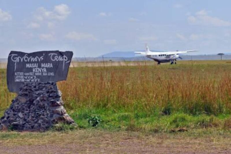 A signpost beside the Musiara airstrip points to Governor's Camp.