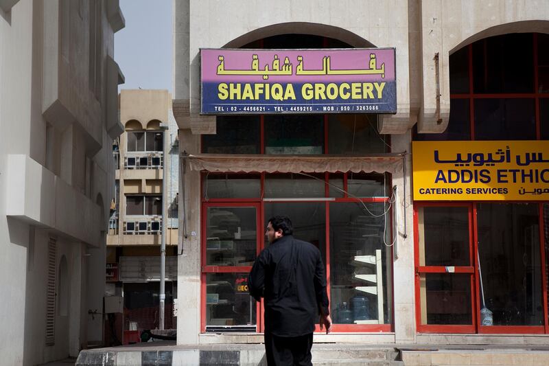 Abu Dhabi, United Arab Emirates, January 10, 2013: 
Men finish with their prayers at a mosque near by the Malabar Grocery, a recently closed convenience store on Thursday, Jan. 10, 2013, in the city block between Airport and Muroor, and Delma and Mohamed Bin Khalifa streets in Abu Dhabi. 
Silvia Razgova/The National

