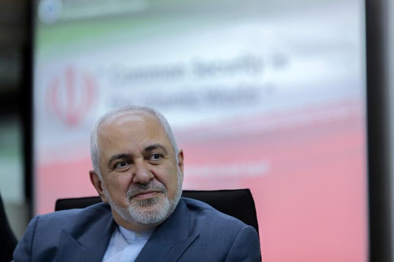 Iranian Foreign Minister Mohammad Javad Zarif sits during a forum titled "Common Security in the Islamic World" in Kuala Lumpur, Malaysia, Thursday, Aug. 29, 2019. Zarif said Iranâ€™s supreme leader will not meet with U.S. President Donald Trump unless Washington halts its â€œeconomic terrorismâ€ that has hurt ordinary Iranian civilians. Zarif said the removal of U.S. sanctions could also help salvage the Iranian nuclear deal, which may break apart after the U.S. left last year. (AP Photo/Vincent Thian)
