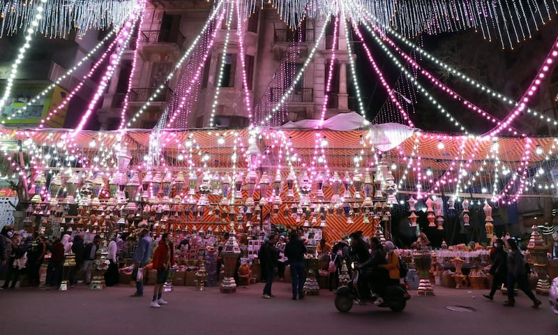 Shoppers browse Ramadan ‘fanous’ (lantern) decorations at a market in Cairo, Egypt, on April 1, 2021. EPA