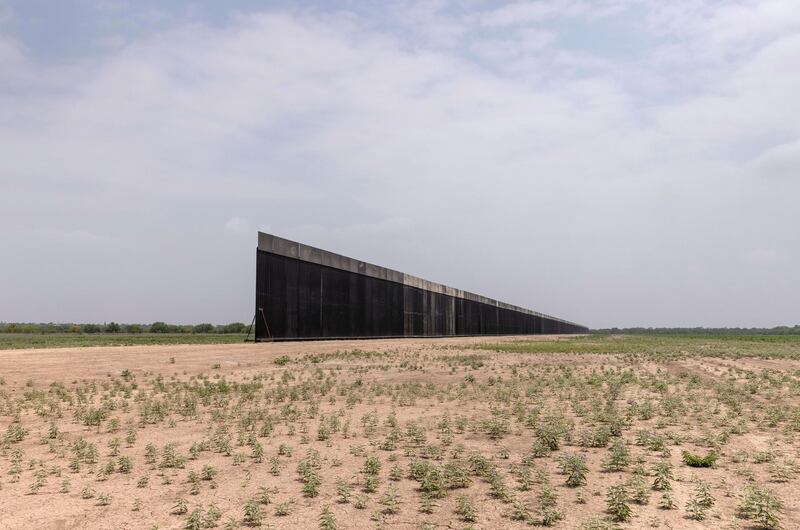 LA JOYA, TEXAS - APRIL 14: A portion of U.S.-Mexico border wall stands unfinished on April 14, 2021 near La Joya, Texas. President Joe Biden paused wall construction by executive order upon taking office in January, 2021. The administration has reportedly decided to possibly finish wall construction on gaps where the wall was largely completed.   John Moore/Getty Images/AFP
== FOR NEWSPAPERS, INTERNET, TELCOS & TELEVISION USE ONLY ==
