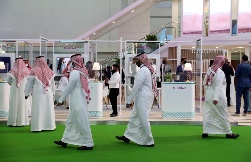 Visitors at the Saudi Arabia stand during the Arabian Travel Market held at Dubai World Trade Centre in Dubai on May 16,2021. Pawan Singh / The National. Story by Deena