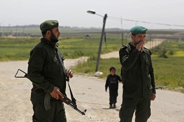 Palestinian Hamas security forces keep watch near the Israel-Gaza border. AFP