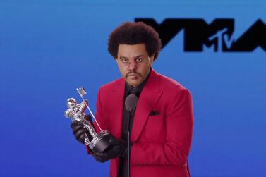 The Weeknd accepts the award for Best R&B during the 2020 MTV VMAs. Despite the success of latest album 'After Hours' and single 'Blinding Lights,' he was not nominated for the 2021 Grammy Awards held on March 14. Viacom