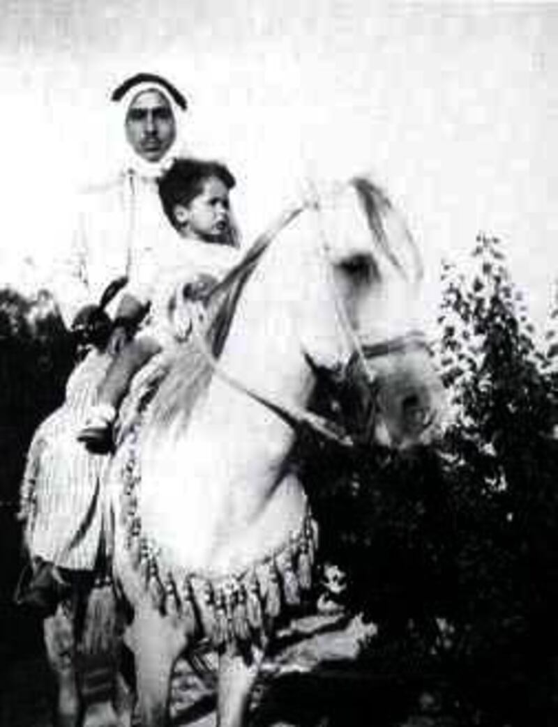 (Files) -- Picture dated 1939 shows Jordan King Hussein riding a horse with his father Talal ibn Hussein in Circa.

Photo datée de 1939 du roi Hussein de Jordanie enfant, à cheval avec son père Talal ibn Hussein à Circa. (Photo by ROYAL FAMILY ALBUM / AFP)