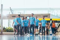 Manchester City players celebrate Etihad Airways’ new home at Zayed International Airport