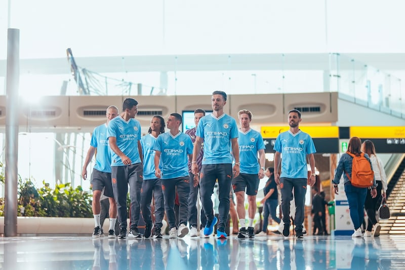 Manchester City players Erling Haaland, Rodrigo, Nathan Ake, Phil Foden, Ederson, Jack Grealish, Kevin De Bruyne and Bernardo Silva during Etihad Airways' celebrations of their new home at the Zayed International Airport. Photo: Manchester City FC